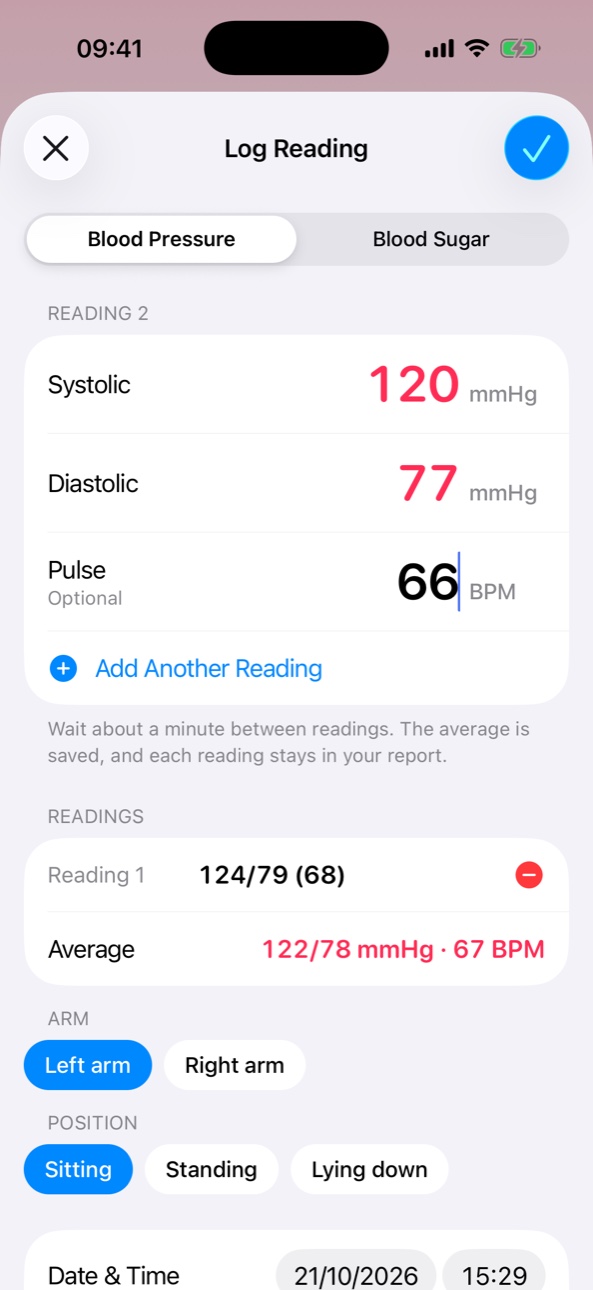 Logging a blood pressure reading: a second reading is being entered and the average of both is shown.